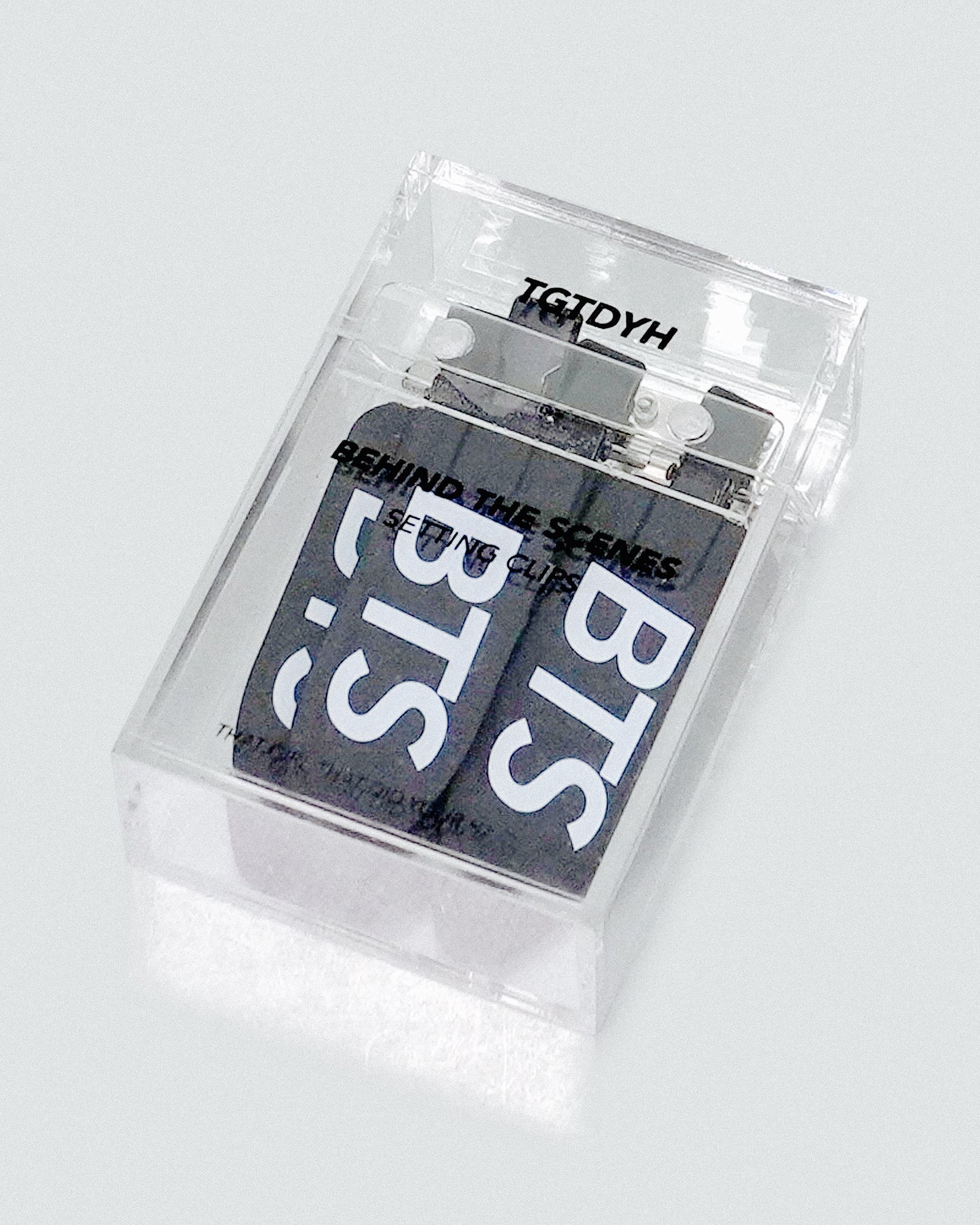 4 Behind-the-Scenes Clips and Acrylic Case