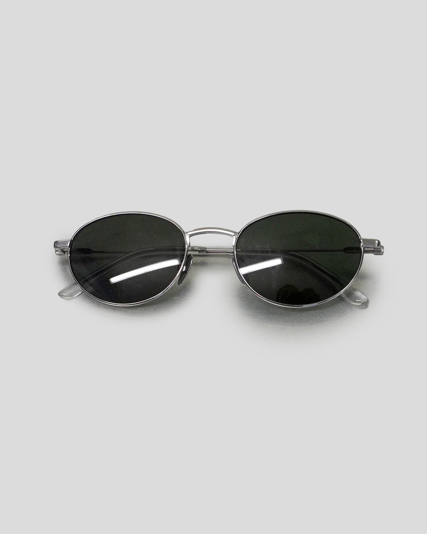 The Cruz with Silver Frame & Green Lens