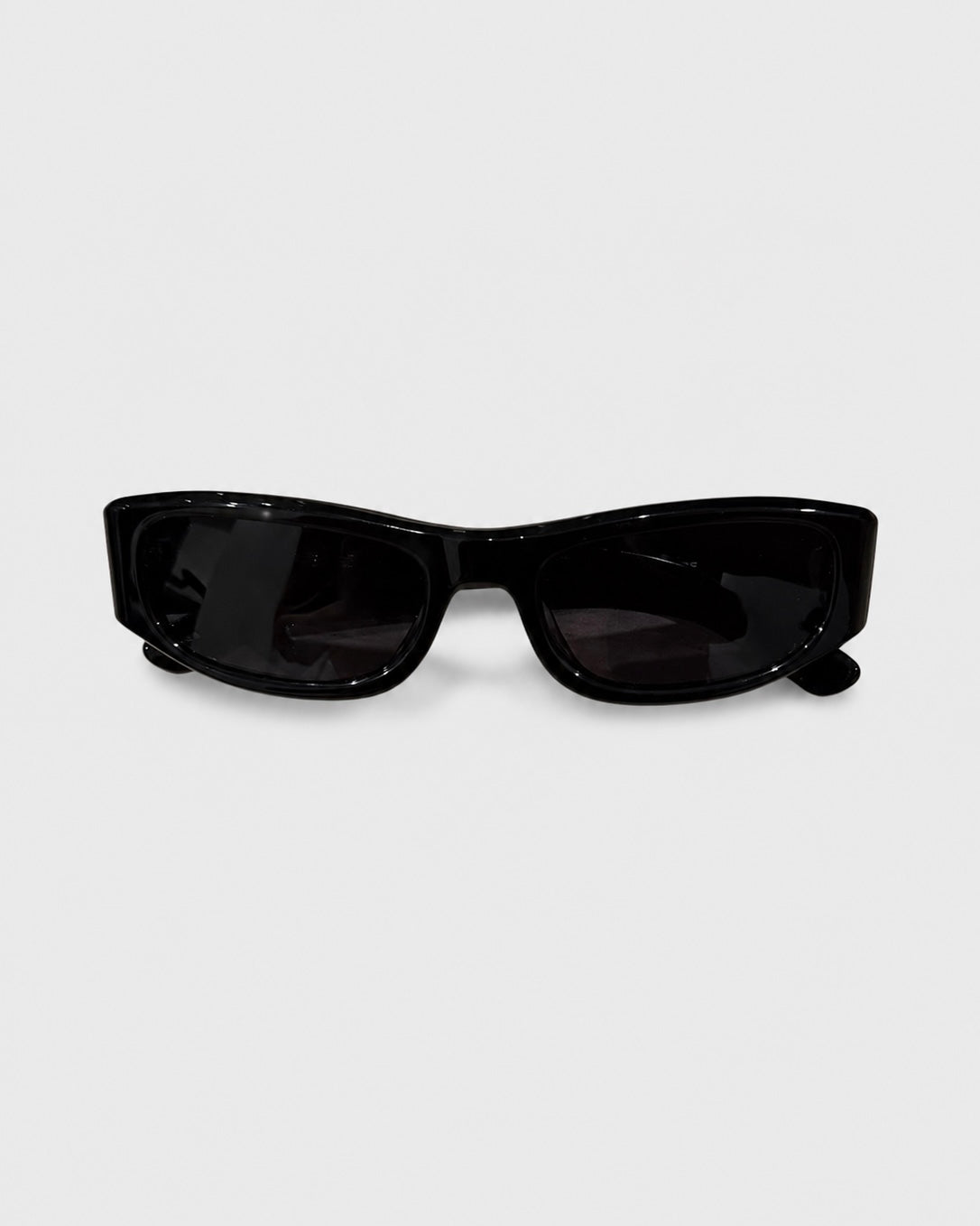 Black sunglasses on a white background