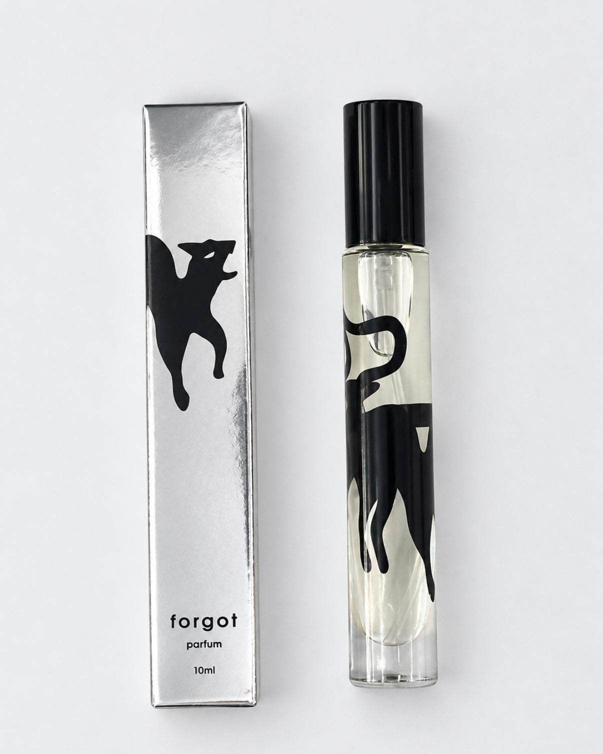A 10ml perfume rollerball bottle and its matching silver packaging box, both featuring a black silhouette of a dog and the text 'forgot parfum 10ml' on a clean white background.