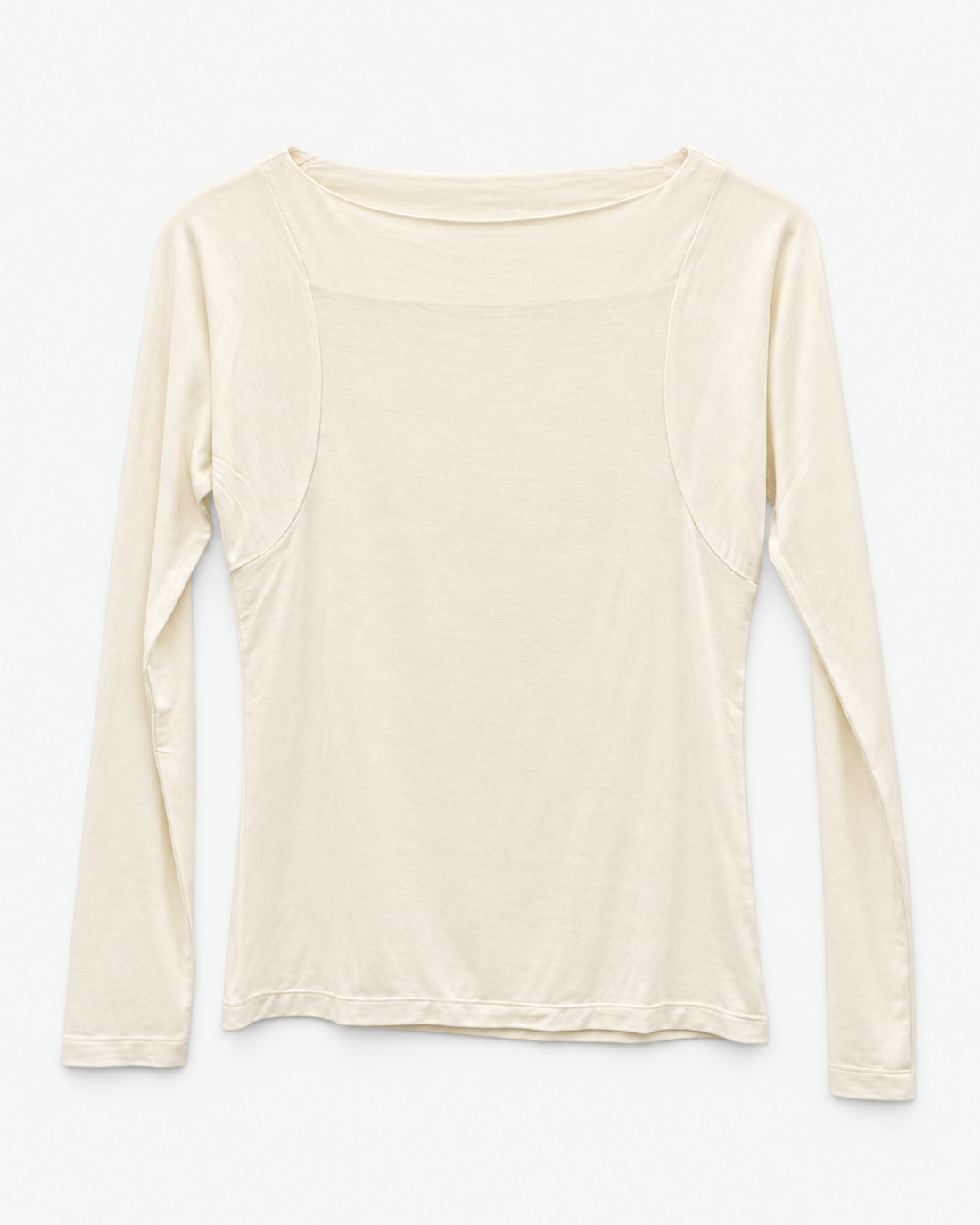 A cream-colored long-sleeve top with a wide boat neckline and a sheer, semi-transparent yoke panel across the chest, displayed flat against a light gray background.